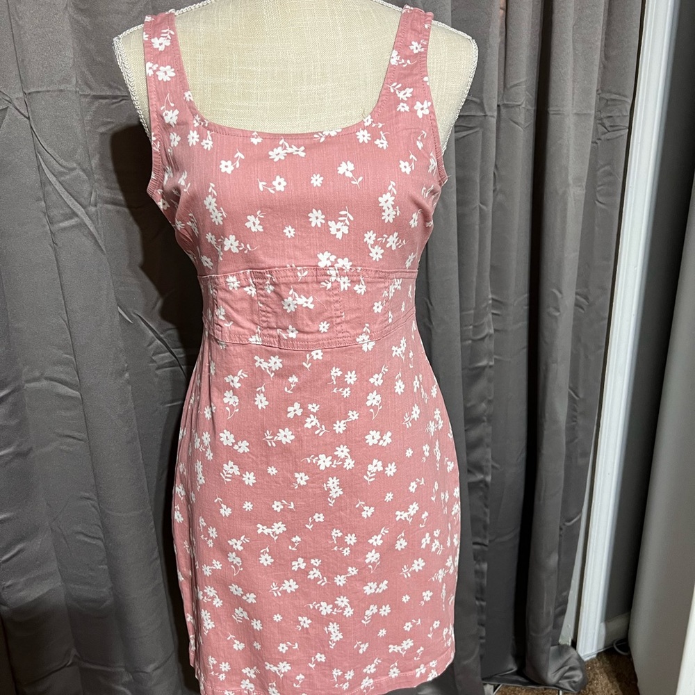 Pink summer dress with white flowers.